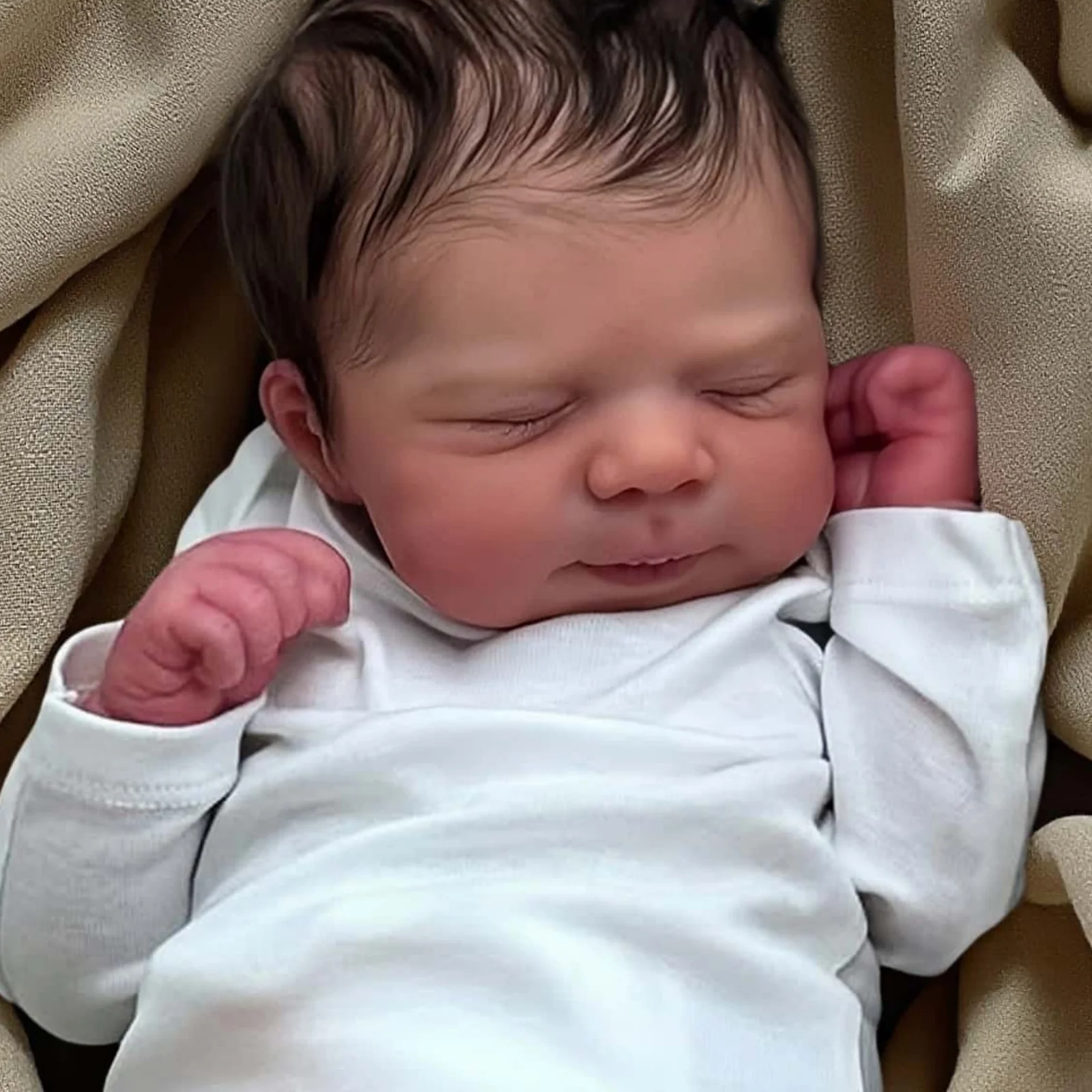 Additional view of the reborn doll and outfit